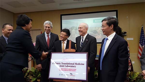 a new facility in Shanghai which expands pediatric cancer research and health care services