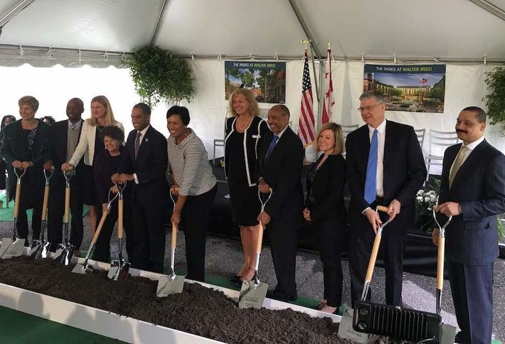 DC officieals join the development team of Hines, Urban Atlantic and Triden to celebrate the Parks at Walter Reed groundbreaking. (Courtesy: Hines)